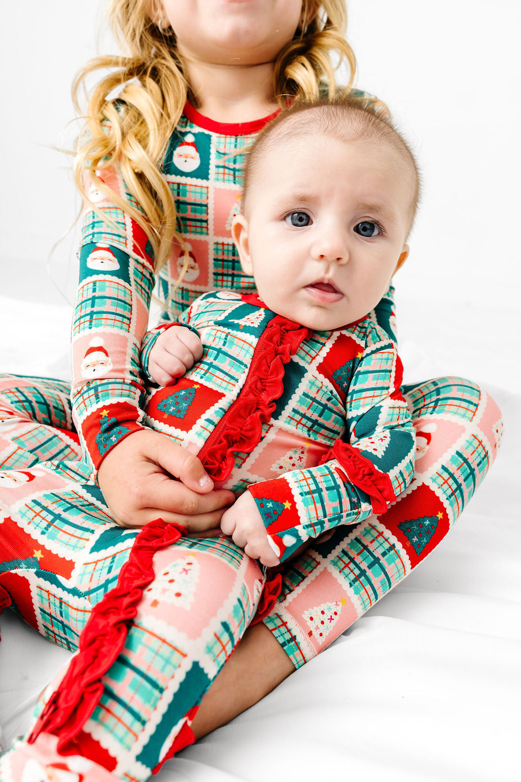 Patchwork Santas Ruffle Footy
