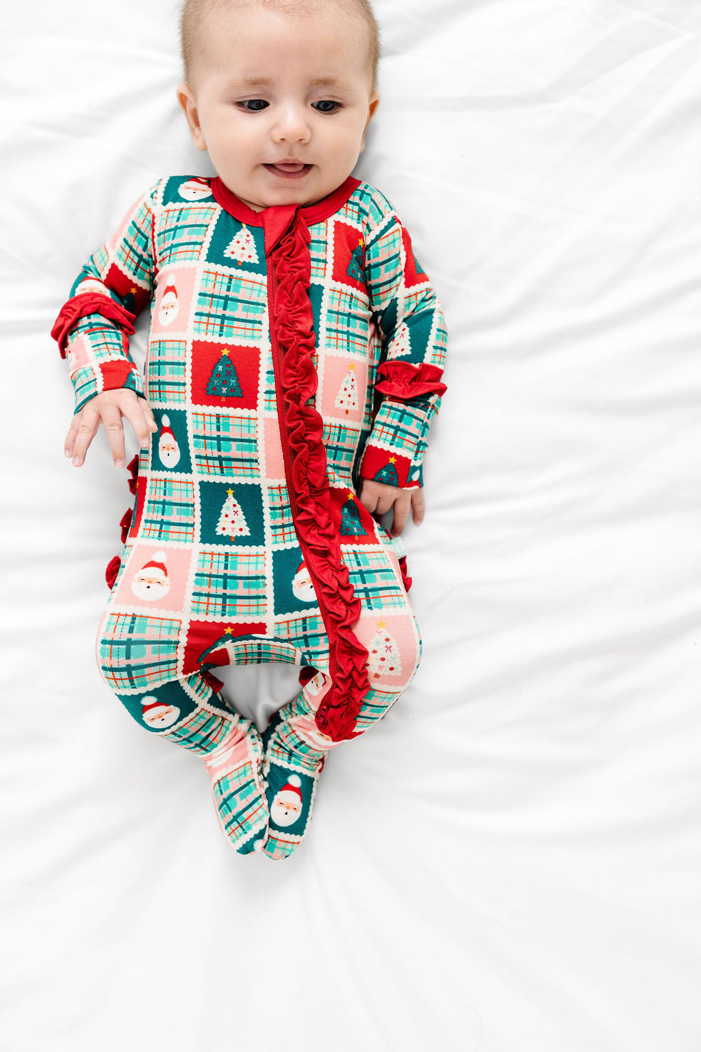 Patchwork Santas Ruffle Footy